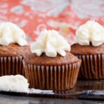 finished carrot cake cupcakes with cream cheese frosting.