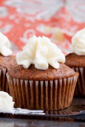 finished carrot cake cupcakes with cream cheese frosting.