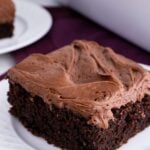 easy chocolate e sheet cake slice on a plate.