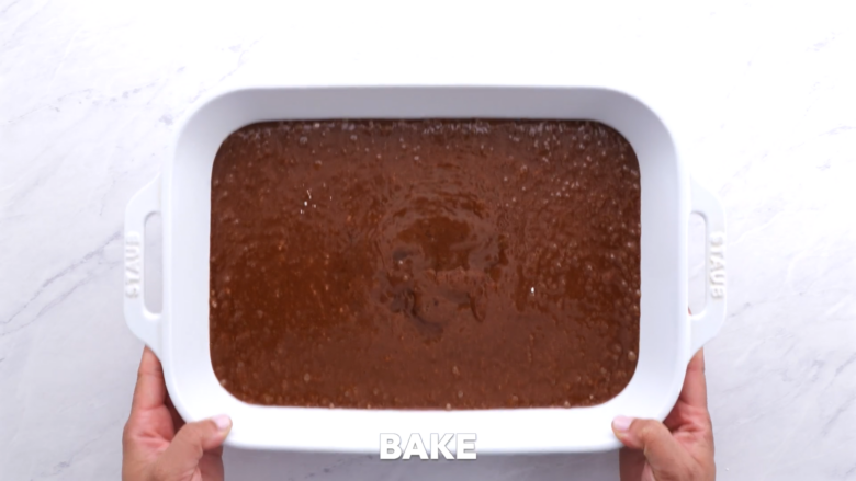 easy chocolate sheet cake batter in baking dish.