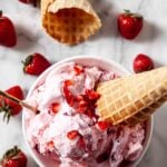 strawberry ice cream in a bowl.