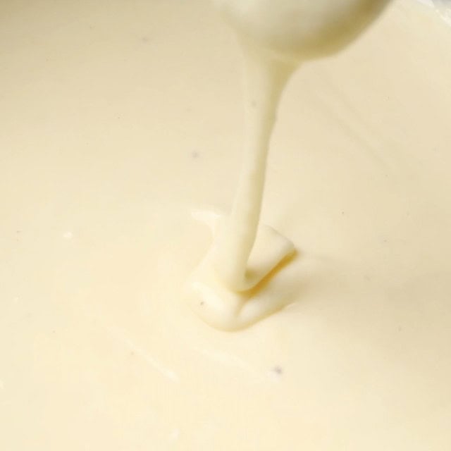 Creamy white cheddar sauce ready for mac and cheese.