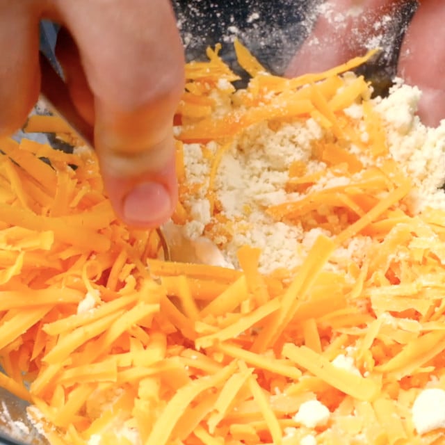 Ingredients to make cheese crackers being mixed together.