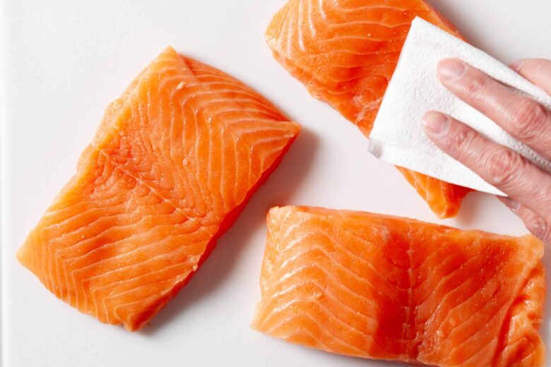 Pat dry salmon fillets before serving.