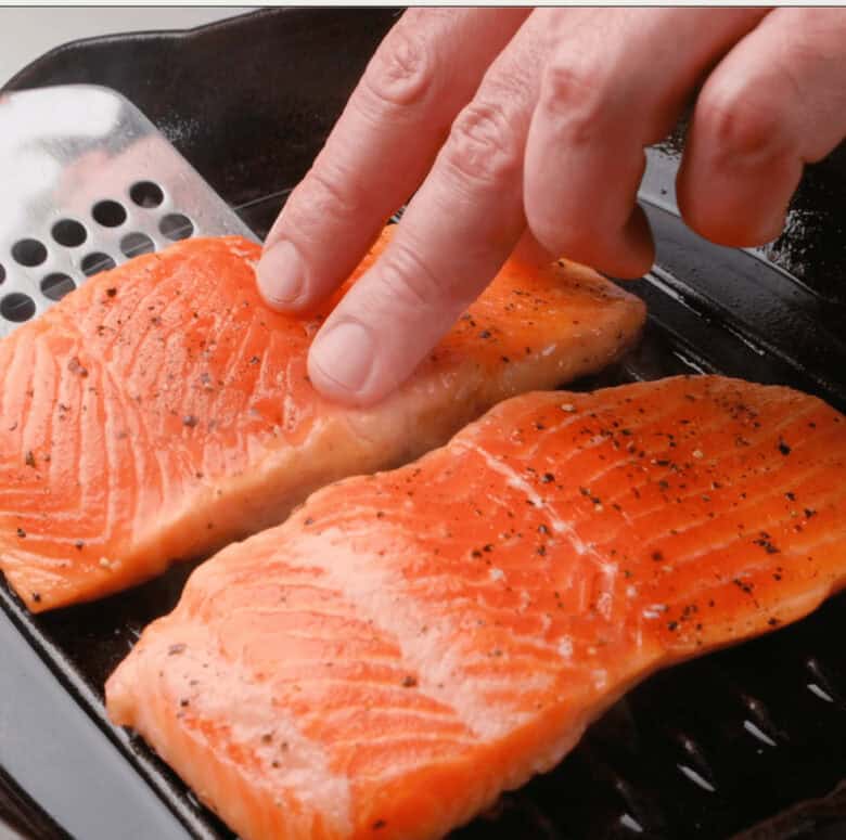 salmon fillets on the grill for grilled salmon. 