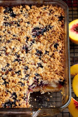peach blueberry crumb bars in pan.