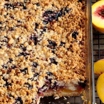 peach blueberry crumb bars in pan.
