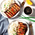 teriyaki salmon served with rice.