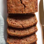 loaf of moist zucchini bread sliced.