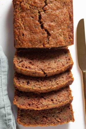 loaf of moist zucchini bread sliced.