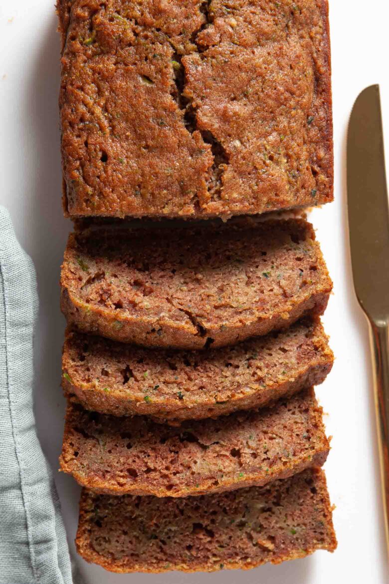 loaf of moist zucchini bread sliced.