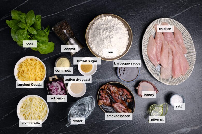 Overhead shot of ingredients to make BBQ chicken pizza.