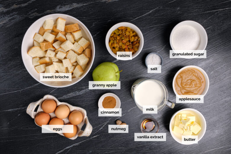 apple bread pudding ingredients of brioche, eggs, milk, applesauce, and more.