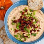 savory pumpkin dip served with crackers.