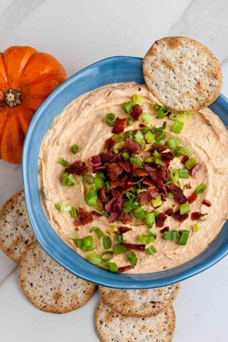 savory pumpkin dip served with crackers.