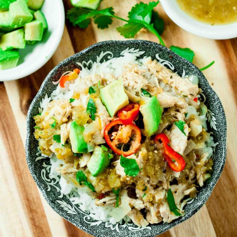 salsa verde chicken in a bowl with rice. 