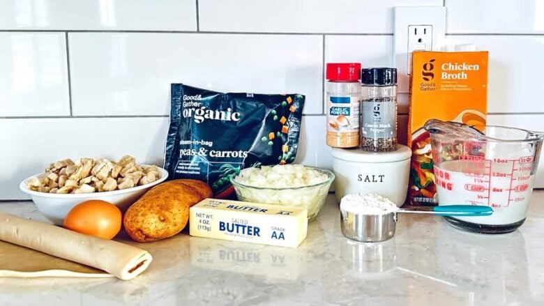 Ingredients to make an easy turkey pot pie on a kitchen counter.