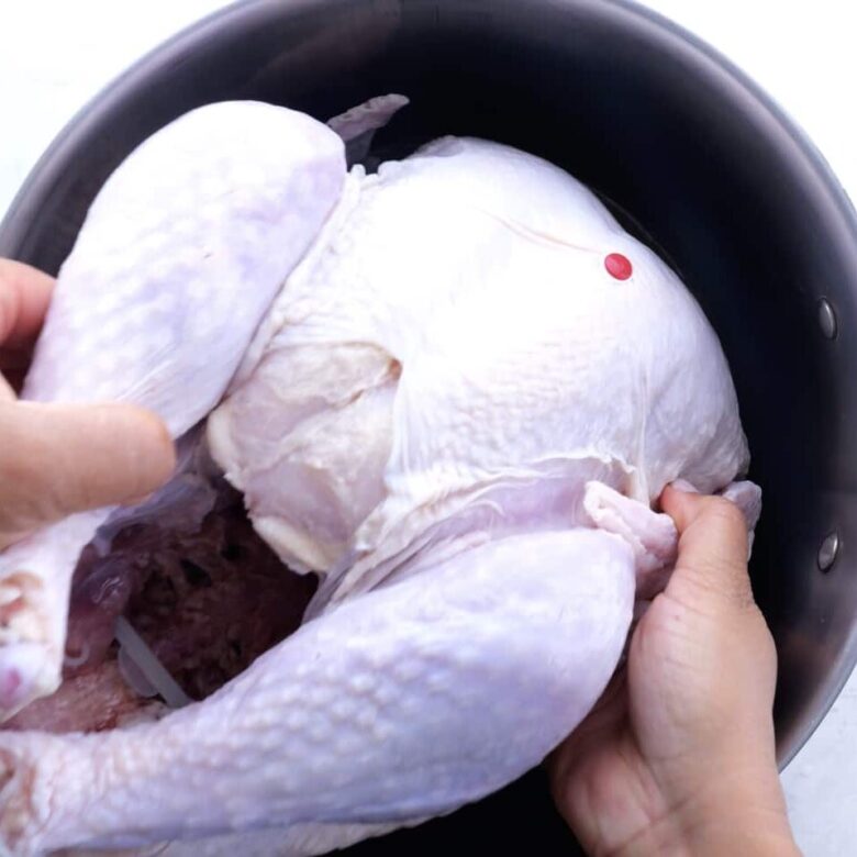 raw turkey added to brine.