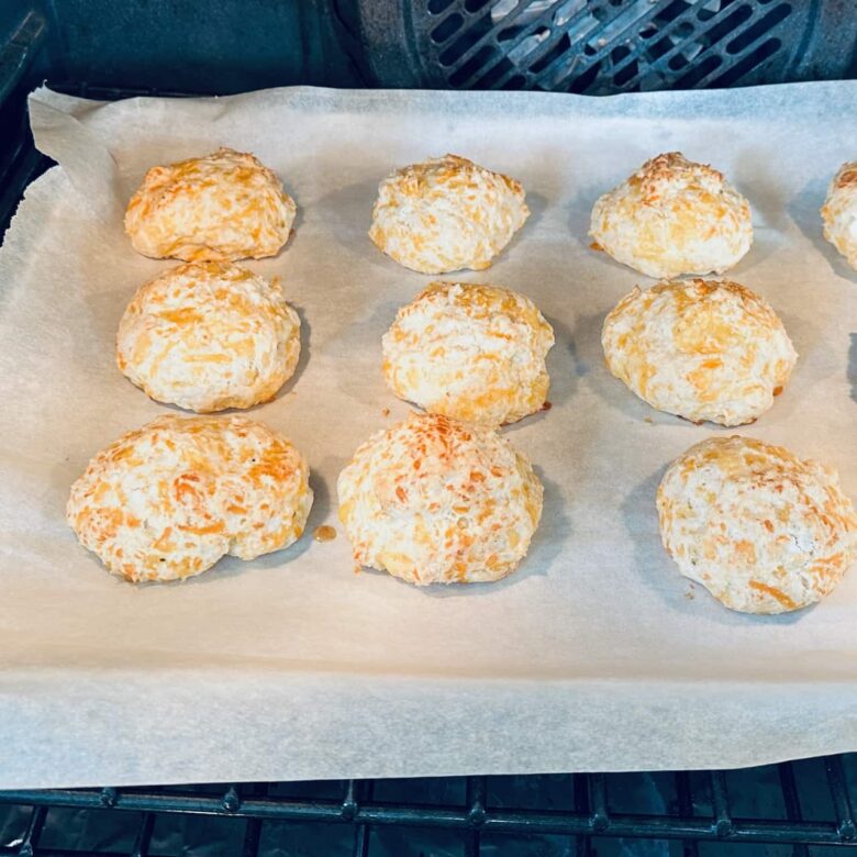 Cheddar bay biscuits being baked in the oven.