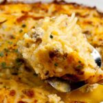 cheesy potato breakfast casserole being served.