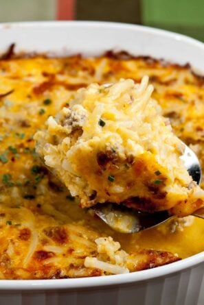 cheesy potato breakfast casserole being served.