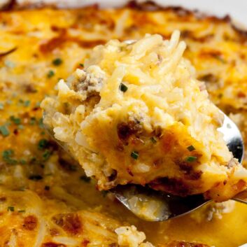 cheesy potato breakfast casserole being served.