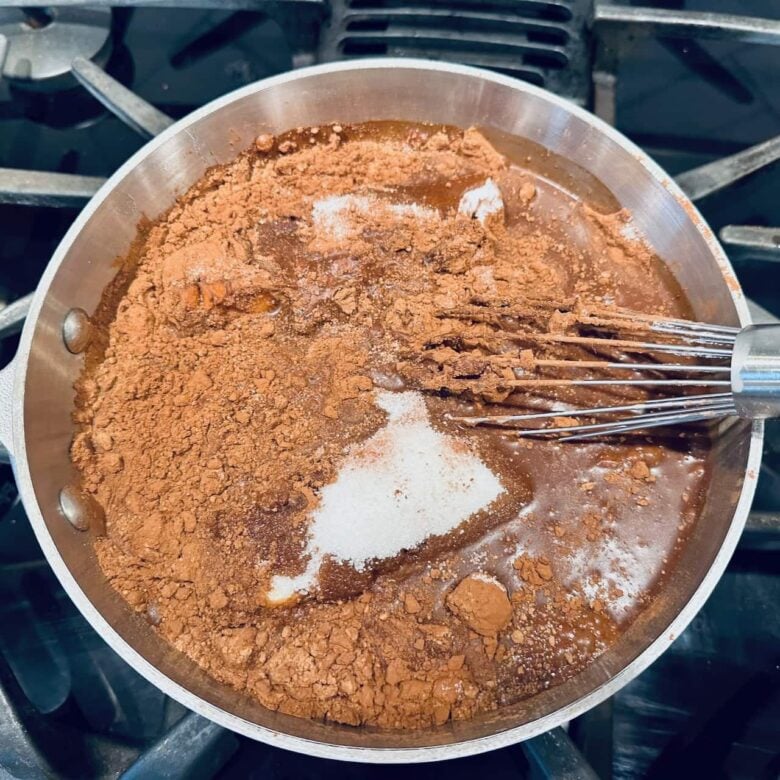chocolate Bundt cake wet ingredients in a saucepan.