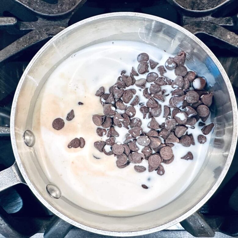 ganache ingredients in a saucepan for chocolate Bundt cake.