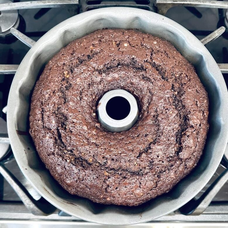 baked chocolate Bundt cake in pan.