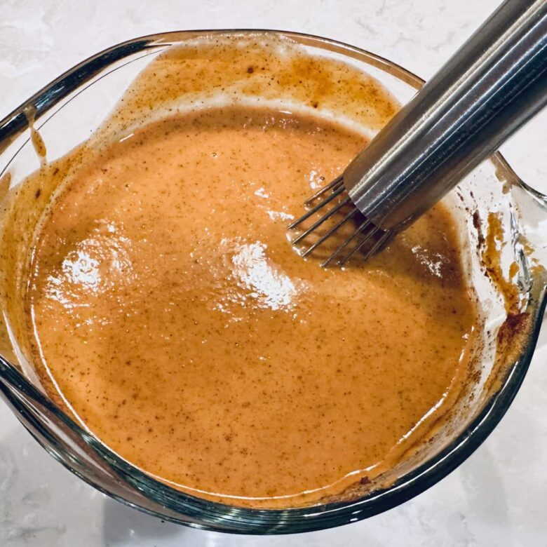 pumpkin pie filling ingredients mixed together.
