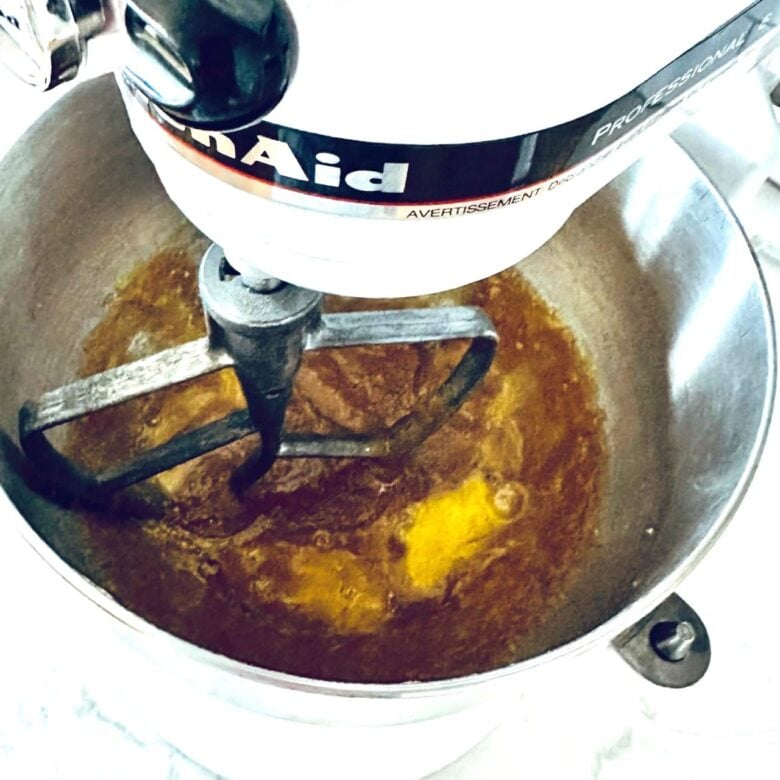 butter and sugar mixed for brown butter chocolate chip cookies.