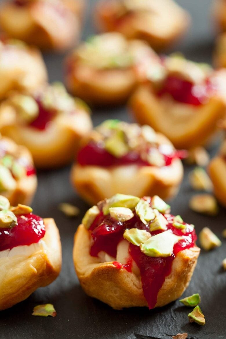 cranberry brie bites sprinkled with chopped pistachios.