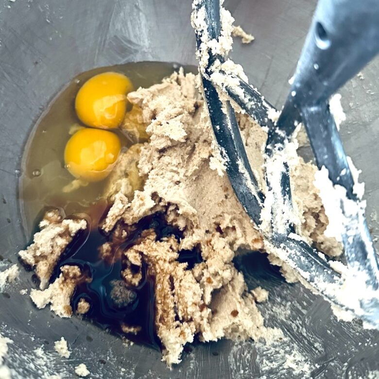 eggs and vanilla added to butter for oatmeal butterscotch cookies.