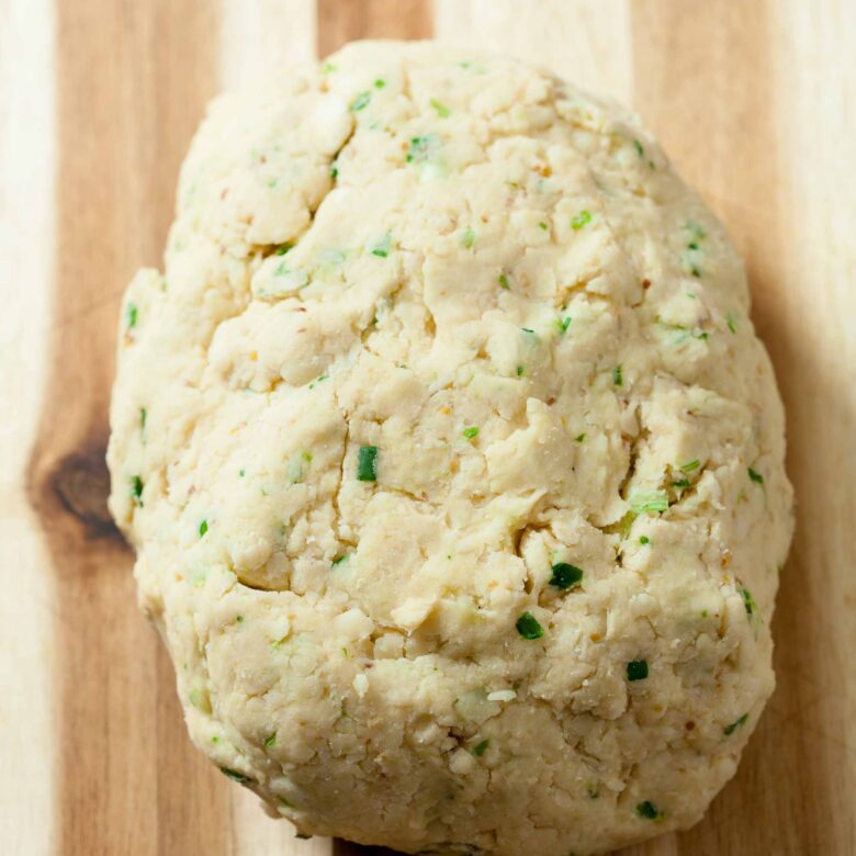 savory scones dough formed into a ball.