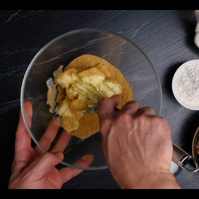 butter and sugar mixed for soft chocolate chip cookies.