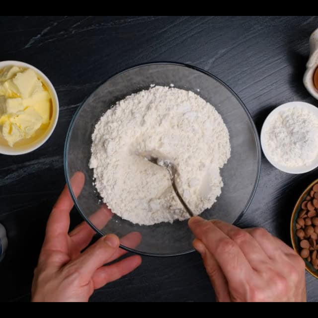 Dry ingredients for soft chocolate chip cookies.