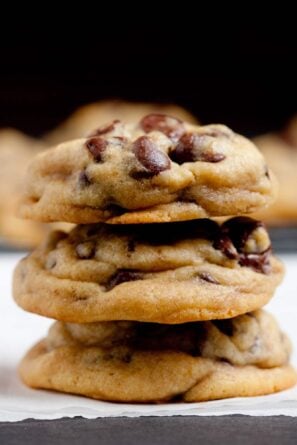 soft chocolate chip cookies piled 3 high.
