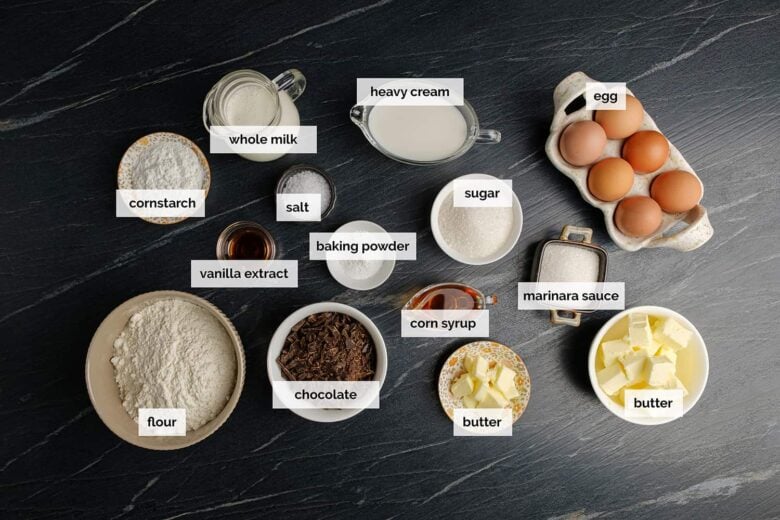 Overhead shot of ingredients to make boston cream cupcakes at home.