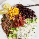 Overhead shot of homemade carnitas burrito bowl.