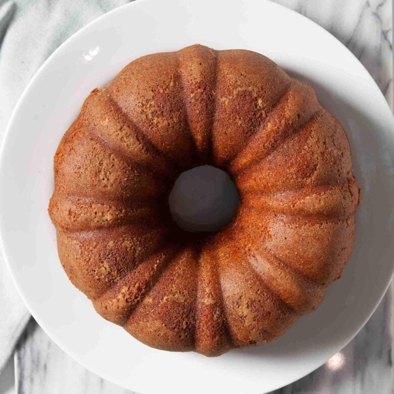 Overhead shot of freshly baked, perfect poppy seed cake.