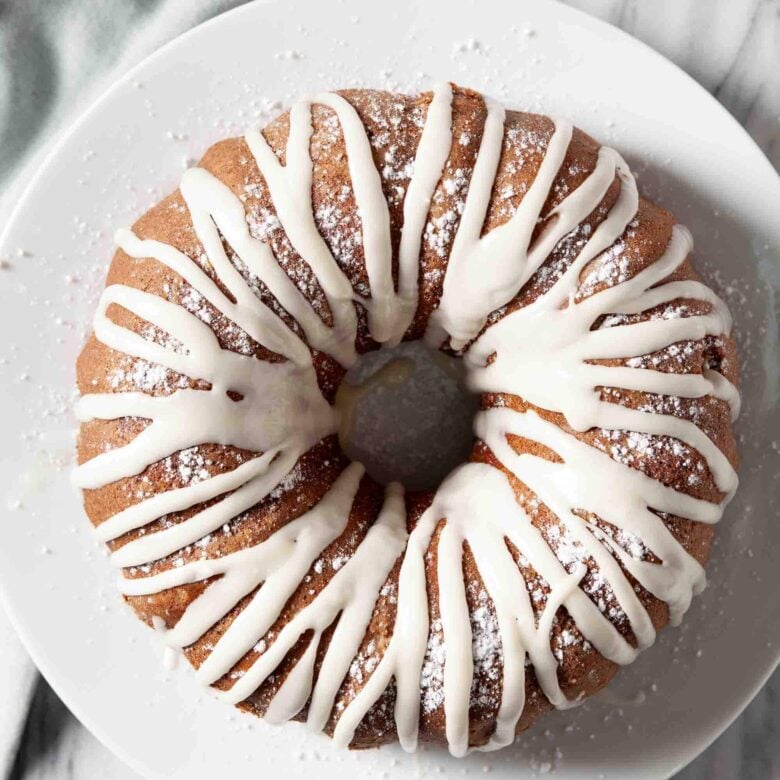 Overhead shot of poppy seed cake with icing on top. 