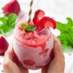 Strawberry frosé garnished with mint, ready to serve.