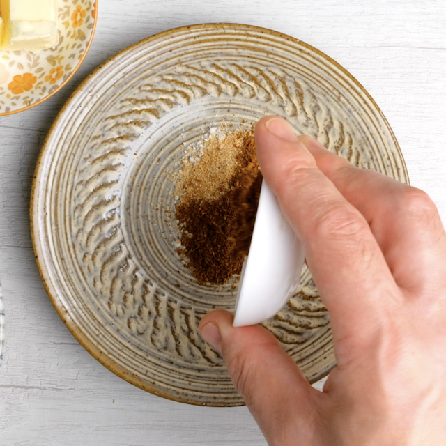 Seasonings to make air fryer tilapia being combined together in a bowl.