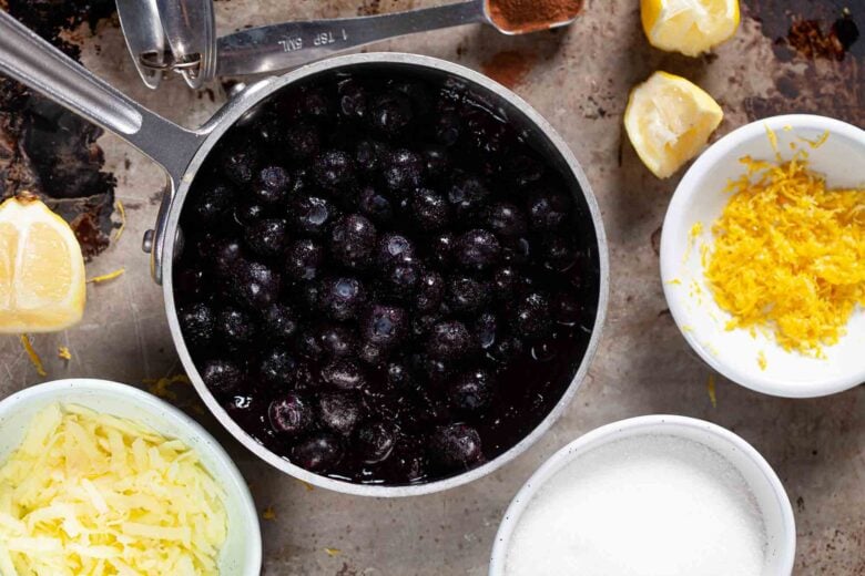 Overhead shot of ingredients to make blueberry pie filling recipe at home.