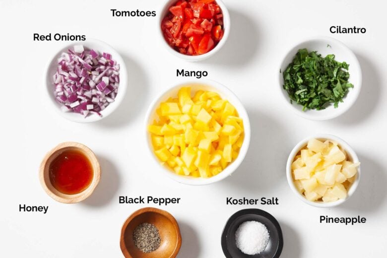 Overhead shot of ingredients to make mahi mahi with mango salsa at home.