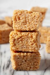 A closeup shot of a stack of three healthy rice krispie treat squares.