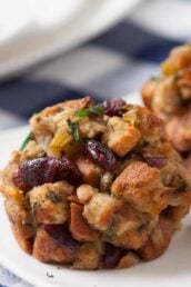 Closeup shot of stuffing muffin with dried cranberries and herb seasoned cubed stuffing.