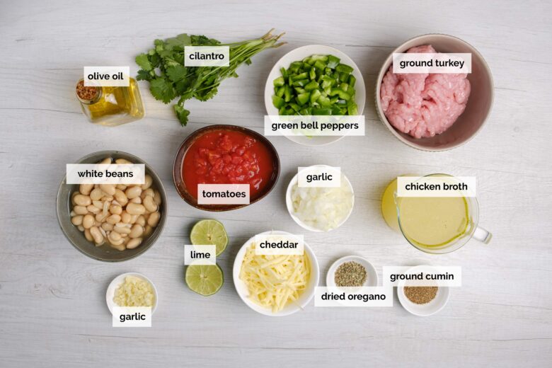 Overhead shot of ingredients to make white bean turkey chili at home.