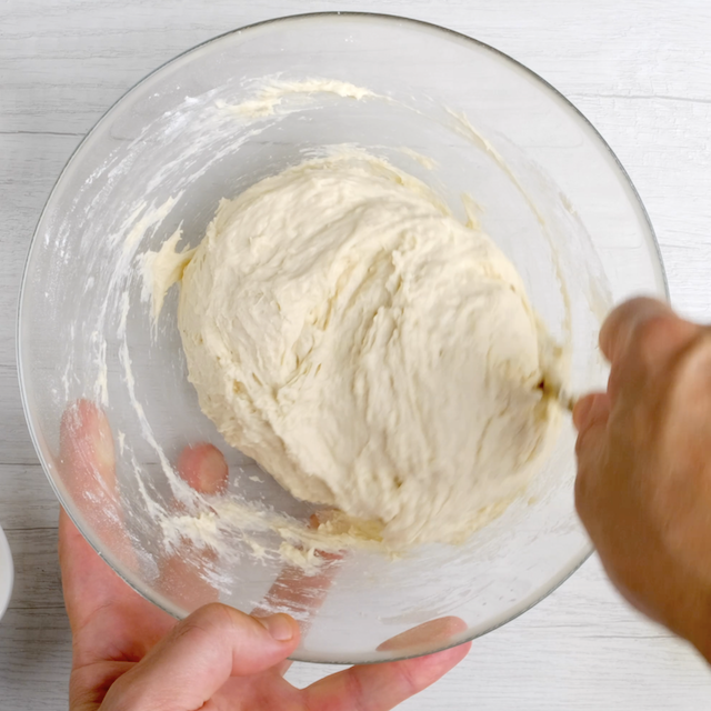 Sticky dough being mixed together.