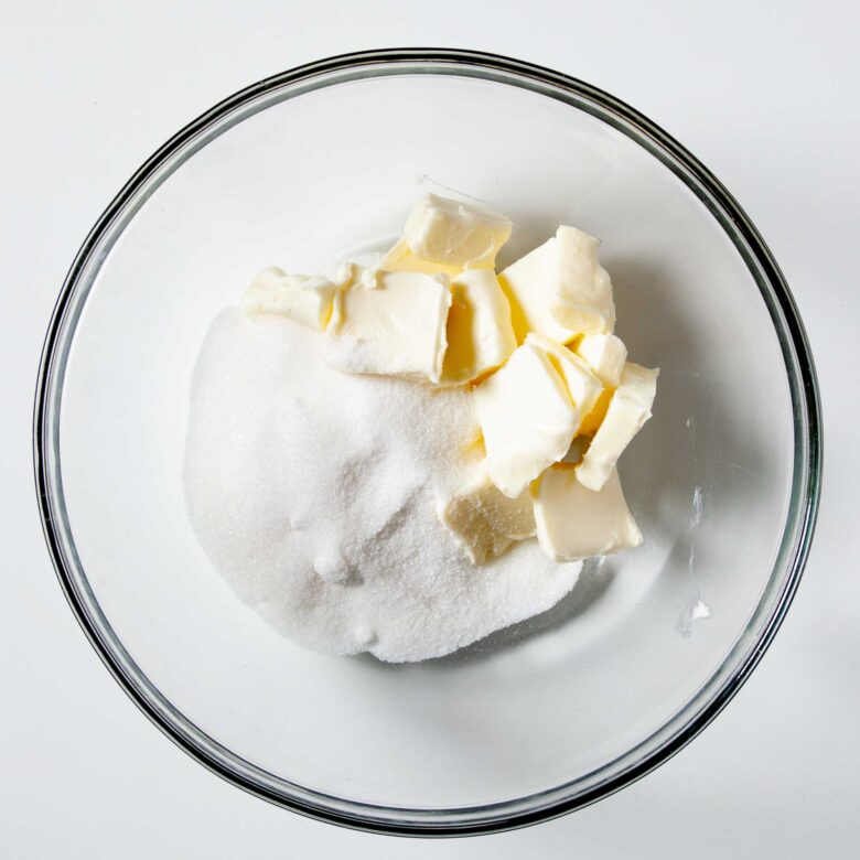 Sugar and butter in a bowl to make snickerdoodle bread.
